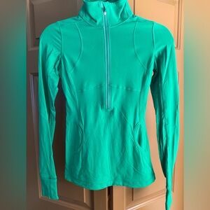 Lululemon Kelly Green Half Zip Mesh & Ruffle Accent Top
